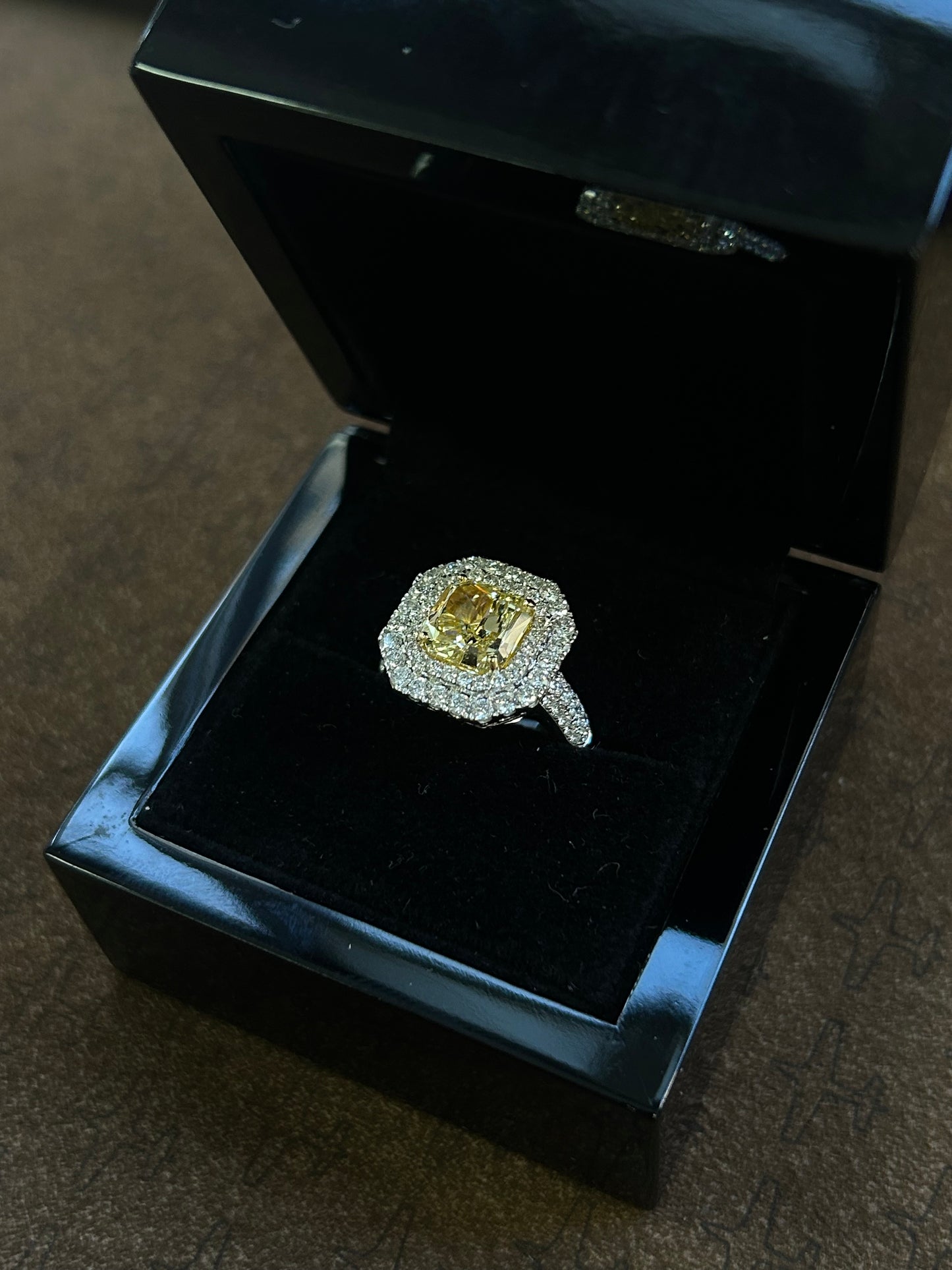 Natural 3.54 Carat Fancy yellow radiant cut ring