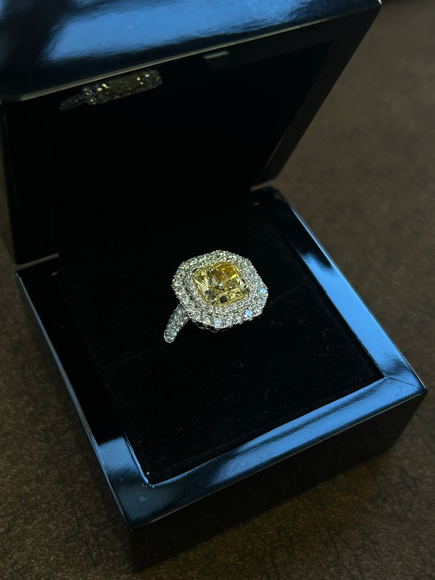 Natural 3.54 Carat Fancy yellow radiant cut ring