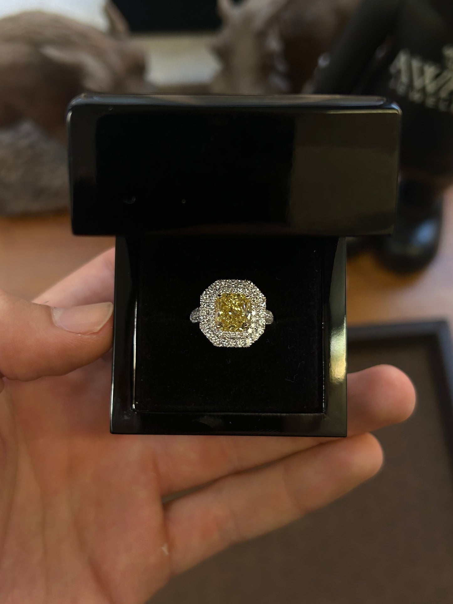 Natural 3.54 Carat Fancy yellow radiant cut ring