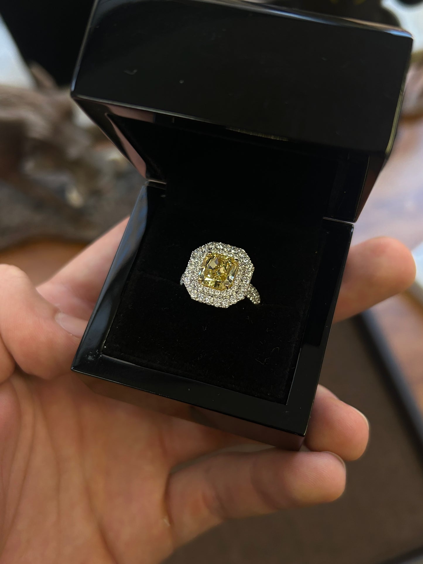 Natural 3.54 Carat Fancy yellow radiant cut ring