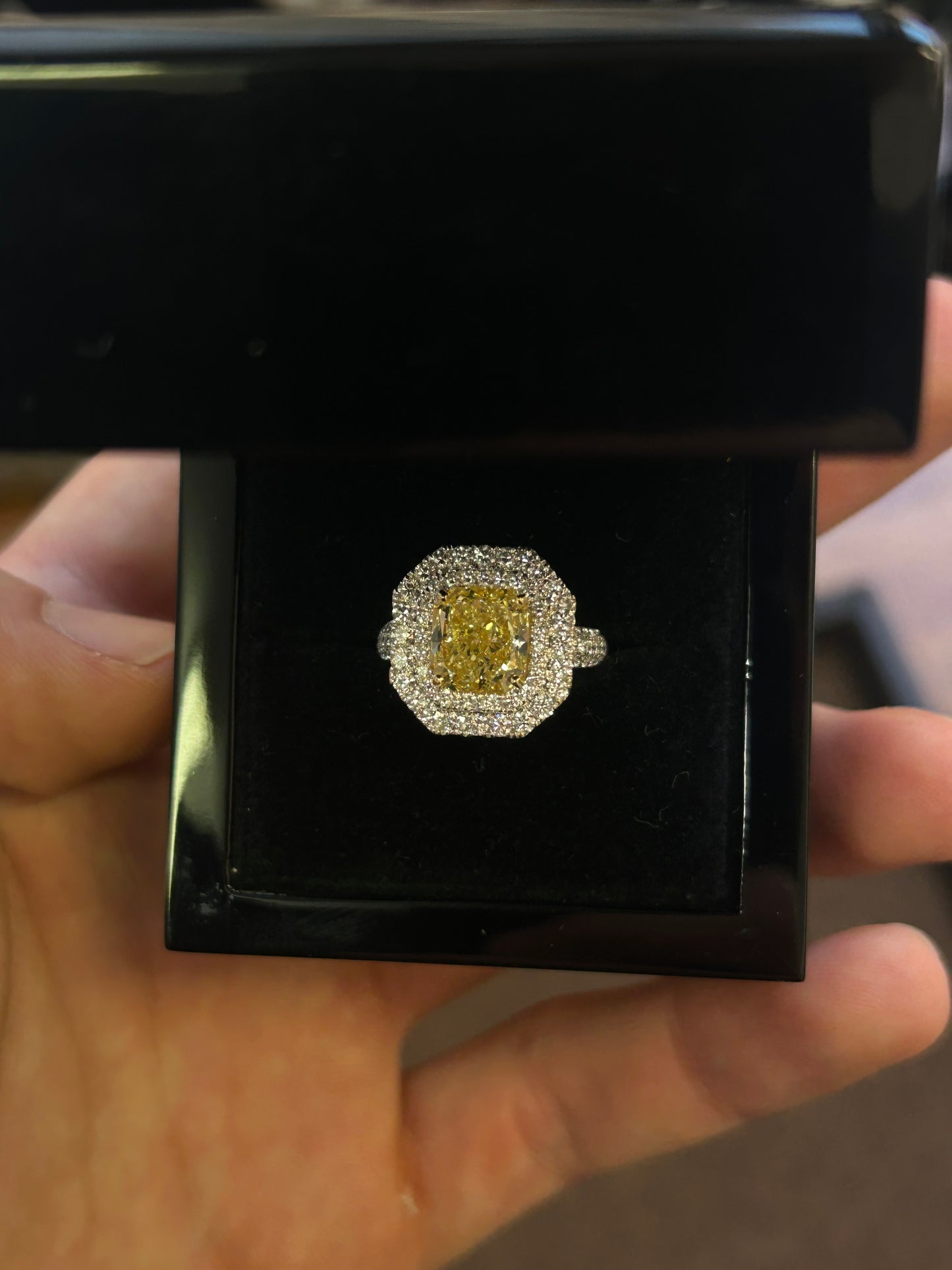 Natural 3.54 Carat Fancy yellow radiant cut ring